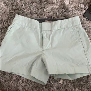 Light green/teal shorts